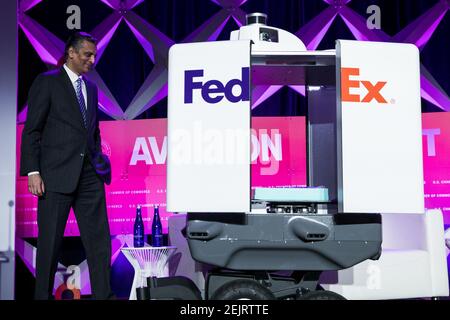 IMAGE DISTRIBUTED FOR FEDEX - Derrick Henry, of the Tennessee Titans,  accepts the 2019 FedEx Ground Player of the Year award from Carson Palmer  at the NFL Honors at the Adrienne Arsht