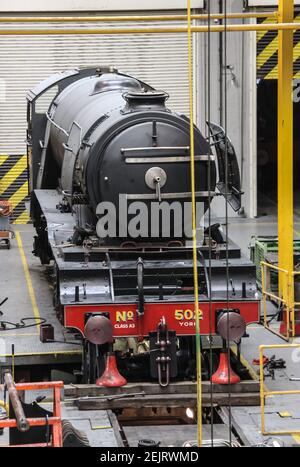 LNER Class A3 4472 Flying Scotsman steam locomotive in black paint while undergoing restoration at the National Railway Museum, York. Stock Photo