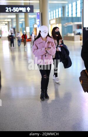 Chinese actress Ju Jingyi arrives at the Beijing Capital International ...