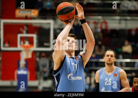 Saint Petersburg, Russia. 22nd Feb, 2021. Arturas Gudaitis (77), of Zenit shoots a basketball during the 2020/2021 Turkish Airlines EuroLeague Regular Season Round 25, match between FC Olimpia Milano and Zenit St. Petersburg at the Sibur Arena. (Final score; Zenit St. Petersburg 79:70 Olimpia Milano) Credit: SOPA Images Limited/Alamy Live News Stock Photo