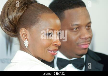 (L-R) Mary J. Blige and Kendu Isaacs attends arrivals for Weinstein Co. Golden Globes After Party at Trader Vics at the Beverly Hills Hilton on January 15, 2007 in Beverly Hills, California. Credit: Jared Milgrim Stock Photo