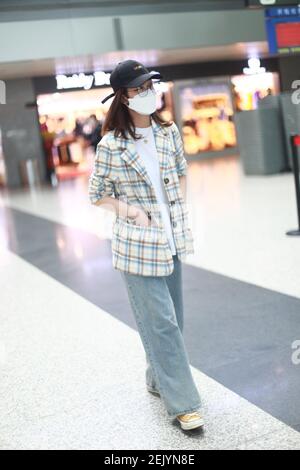 Chinese actress Yan Zhichao arrives at a Chengdu airport before ...