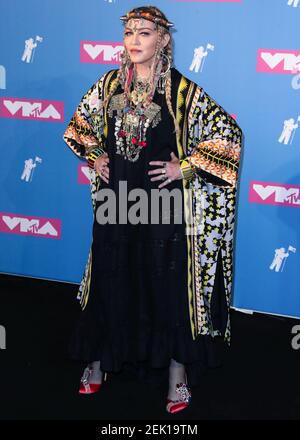 (FILE) Madonna Says She Has Coronavirus COVID-19 Antibodies. MANHATTAN, NEW YORK CITY, NEW YORK, USA - AUGUST 20: Singer Madonna wearing a Temperley London Kimono poses backstage during the 2018 MTV Video Music Awards held at the Radio City Music Hall on August 20, 2018 in Manhattan, New York City, New York, United States. (Photo by Xavier Collin/Image Press Agency/Sipa USA)