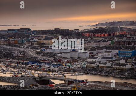 overview onto oa part of the city of Nuuk at sunset, in Greenland Stock Photo