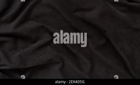 dark brown suede wavy fabric. Texture, background Stock Photo