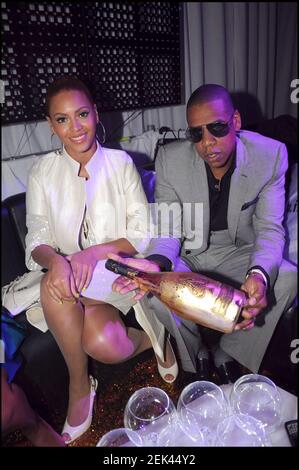 File photo dated May 23, 2008 of Jay Z and wife Beyonce Knowles during 'Armand De Brignac' champagne party at VIP Room in Cannes, France. LVMH, which owns Dom Pérignon and Moët & Chandon, has taken a 50% stake in Jay-Z's Champagne brand Armand de Brignac, also known as 'Ace of Spades.' The terms of the deal were not disclosed. The partnership comes at a time when LVMH is working to appeal to a more diverse clientele. The luxury sector has long been criticized for cultural appropriation, high-profile racist gaffes and a lack of runway diversity. Photo by Rachid Bellak/ABACAPRESS.COM Stock Photo
