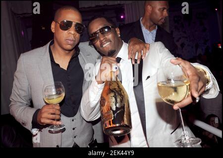 File photo dated May 23, 2008 of Puff Diddy (Sean Combs) and Jay Z during 'Armand De Brignac' champagne party at VIP Room in Cannes, France. LVMH, which owns Dom Pérignon and Moët & Chandon, has taken a 50% stake in Jay-Z's Champagne brand Armand de Brignac, also known as 'Ace of Spades.' The terms of the deal were not disclosed. The partnership comes at a time when LVMH is working to appeal to a more diverse clientele. The luxury sector has long been criticized for cultural appropriation, high-profile racist gaffes and a lack of runway diversity. Photo by Rachid Bellak/ABACAPRESS.COM Stock Photo