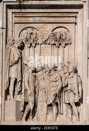 Rome. Italy. Arch of Constantine (Arco di Costantino), detail of sculptural relief depicting Roman emperor Marcus Aurelius (head replaced with that of Stock Photo