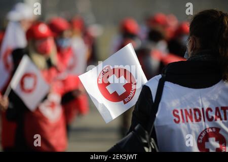 Bucharest, Romania - February 23, 2021: Details with the logo of the healthcare union Sanitas on a flag during a protest. Stock Photo