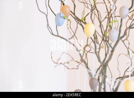 Easter. Vase with birch tree branches with Easter eggs Stock Photo