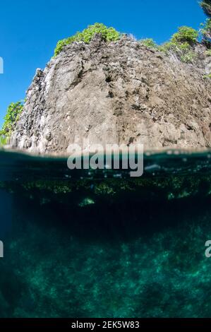 Island with reef, Boo Point East dive site, Boo Island, Raja Ampat, West Papua, Indonesia Stock Photo
