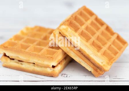 Belgian waffles close up isolated on white background. Delicious, fresh baked goods Stock Photo