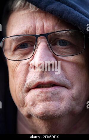 Man in Sixties with Glasses Face Detail Stock Photo