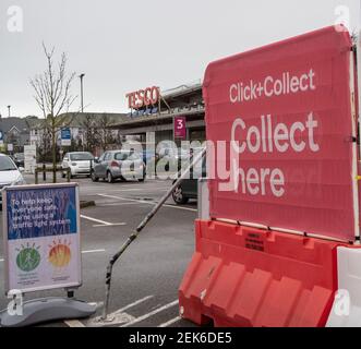 Click and collect at a Tesco supermarket in Seaton, Devon. Food delivery and collect systems have been in great demand during the Covid pandemic. Stock Photo