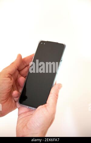 Man Holding Mobile Phone Stock Photo
