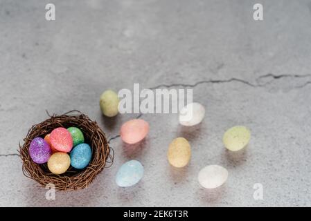 Colourful Easter eggs on gray cement background Stock Photo