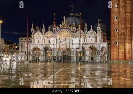 Night shot of the illuminated famous St Mark's Basilica or Basilica di San Marco, Venice, Veneto, Italy Stock Photo