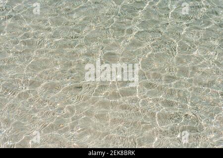 Soft blue sea wave on clean sandy beach. Holiday vacation and travel concept. Elafonisi Greece. Stock Photo