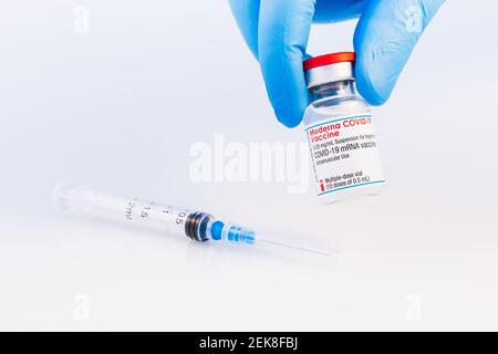 Brasov, Romania - February 21, 2021: Moderna Covid-19 vaccine on a white background. Stock Photo