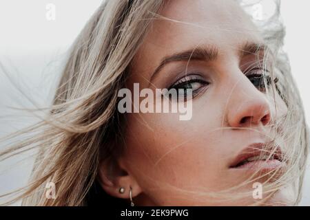 Close-up portrait of beautiful woman with blond hair Stock Photo