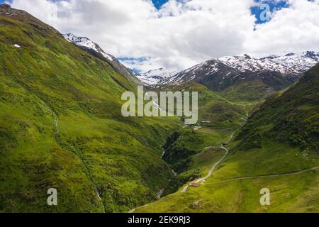Switzerland, Furka Pass, James Bond Street, Mountains and road in valley Stock Photo