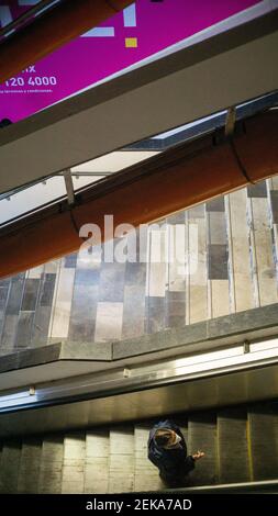 Person going up on escalators in the Mexico City subway Stock Photo