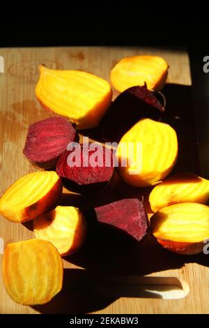 Raw beetroots cut in halves Stock Photo