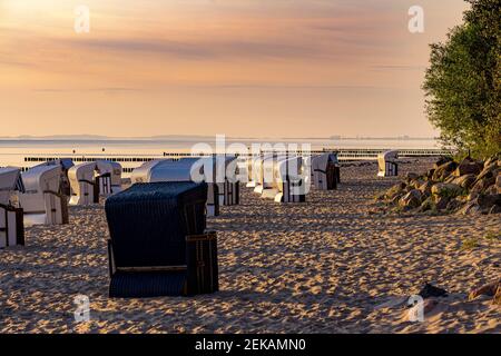 Abundance of deck chair on beach during sunset at Usedom, Mecklenburg-vorpommern, Germany Stock Photo