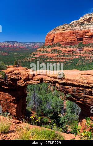 Red rock formation on sunny day against clear blue sky, Devil's Bridge Trailhead, Sedona, Arizona, USA Stock Photo