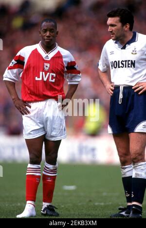 Ian Wright (Arsenal) with just one boot and Neil Ruddock (Spurs) Soccer FA Cup Semi Final  Arsenal versus Tottenham Hotspur at Wembley Stadium.  Photo by Tony Henshaw Stock Photo