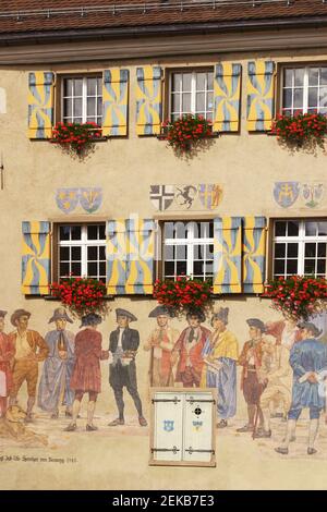 Maienfeld, Switzerland. Mural on the town hall: 'Transfer of legal authority to the last governor, Jacob Ulrich Sprecher von Bernegg, 1797' Stock Photo