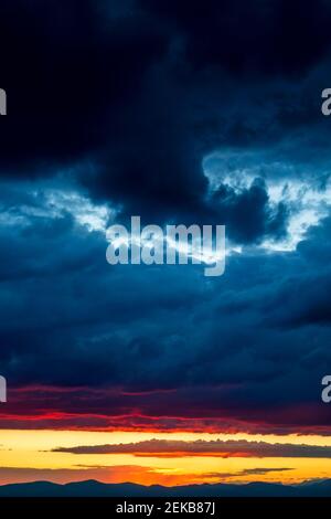 Dramatic cloudy sky during sunset Stock Photo