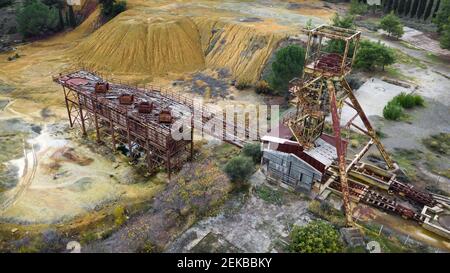 Rusty machinery at the old copper mine, aerial view Stock Photo