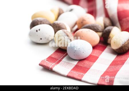 Chocolate easter eggs. Sweet candy eggs isolated on white background. Stock Photo