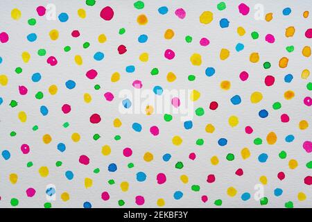 Colorful watercolor abstract dots pattern on white paper background Stock Photo