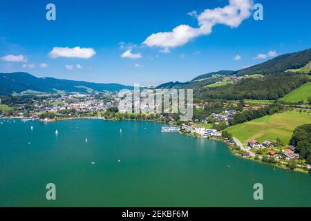 Austria, Upper Austria, Mondsee, Aerial view of town on shore of Mondsee Lake in summer Stock Photo