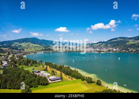 Austria, Upper Austria, Mondsee, Aerial view of town on shore of Mondsee Lake in summer Stock Photo