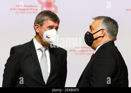 Czech Prime Minister Andrej Babis and Hungarian Prime Minister Victor Orban seen speaking to each other after press conference.  Summit of Heads of Go Stock Photo