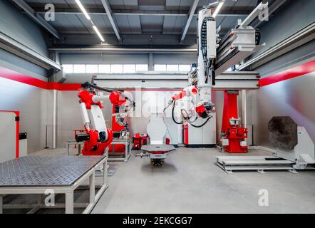 Automatic industrial robots for welding at factory Stock Photo