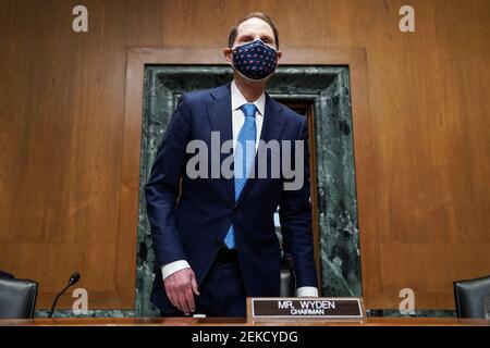 Washington, United States Of America. 23rd Feb, 2021. Senate Finance Committee Chairman Ron Wyden (D-Ore.) arrives for a nomination hearing for Deputy Treasury Secretary nominee Adewale Adeyemo on Tuesday, February 23, 2021 at Capitol Hill in Washington, DCCredit: Greg Nash/Pool via CNP | usage worldwide Credit: dpa/Alamy Live News Stock Photo