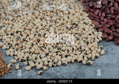 Uncooked kidney beans on a grey background Stock Photo