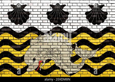 flag of Poole painted on brick wall Stock Photo