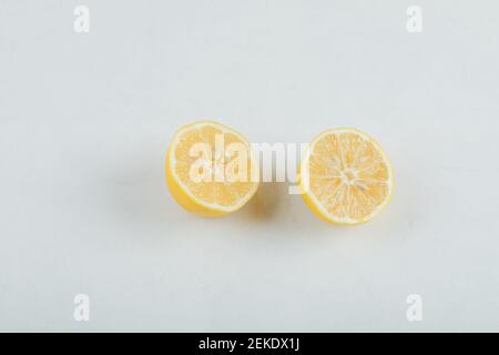 Two slices of lemon on a white background Stock Photo