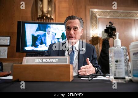 Washington, USA. 23rd Feb, 2021. Senator Mitt Romney, a Republican from Utah, questions Xavier Becerra, secretary of Health and Human Services (HHS) nominee for U.S. President Joe Biden, during a Senate Health, Education, Labor and Pensions Committee confirmation hearing in Washington, DC, U.S., on Tuesday, Feb. 23, 2021. Biden's pick to lead HHS gives him a fierce defender of Democratic causes but one without hands-on experience leading a massive federal agency in the middle of an unprecedented public health crisis. (Photo by Sarah Silbiger/Pool/Sipa USA) Credit: Sipa USA/Alamy Live News Stock Photo