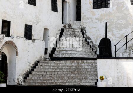 Elmina Castle fishing village Ghana Africa. West Africa on Atlantic ocean. Erected by the Portuguese in 1482. Over 500 years was for slave transport. Stock Photo