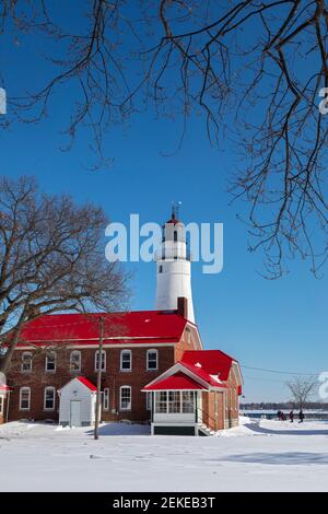 Port Huron, Michigan - The Fort Gratiot Lighthouse. Built in 1829 to mark the entrance to the St Clair River from Lake Huron, it is the oldest lightho Stock Photo