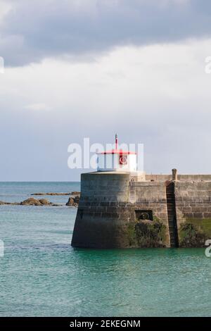 Port entrance Barfleur Harbour, Cotentin Peninsula, Lower Normandy, France. Starting point of William the Conqueror Stock Photo