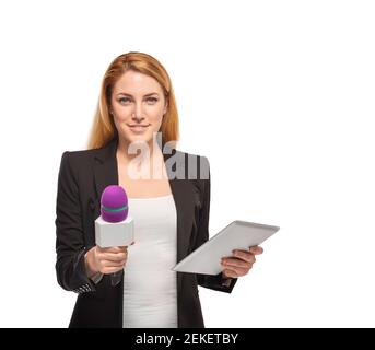 A woman reporter is holding a microphone. The Stock Photo