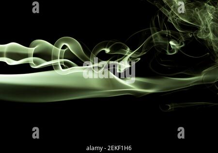 yellow smoke texture on black background Stock Photo