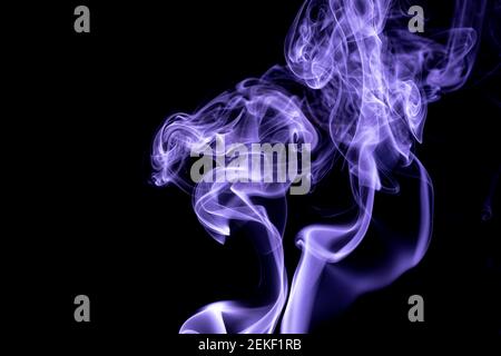 purple smoke texture on black background Stock Photo